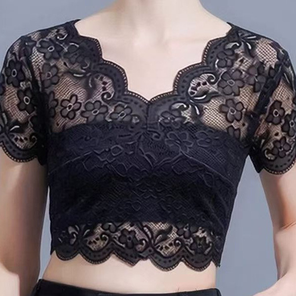 Elegant V-neck lace cropped top paired with a skirt and a sheer inner layer to prevent wardrobe malfunctions.