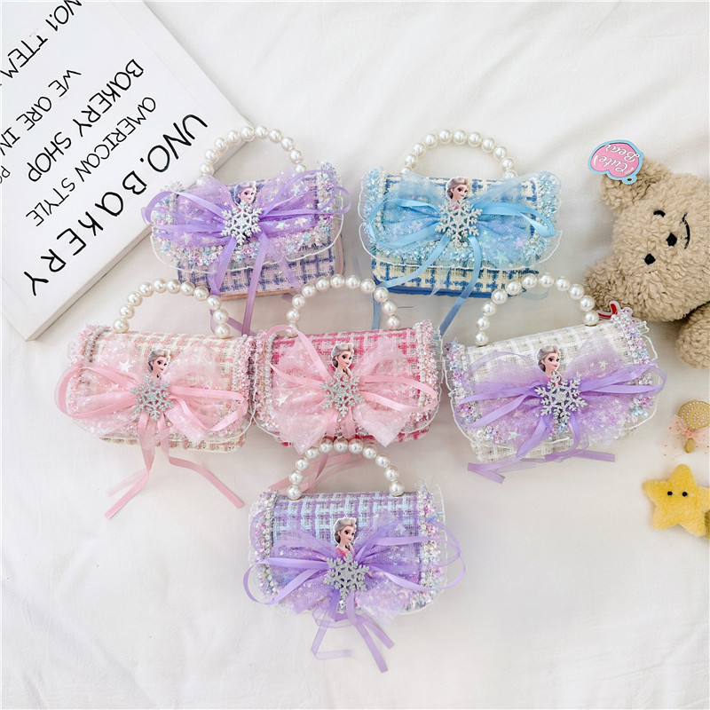 2024 nuevo bolso de moda para niños princesa perla bolso de cambio de mano cadena de chicas bolso de hombro