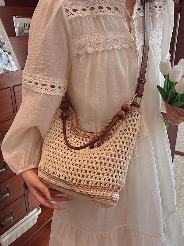 Vacaciones en la playa nuevas bolsas de mujer 2026 moda hueco trenzado bolsa de playa de viaje simple bolsa tote mochila image 3