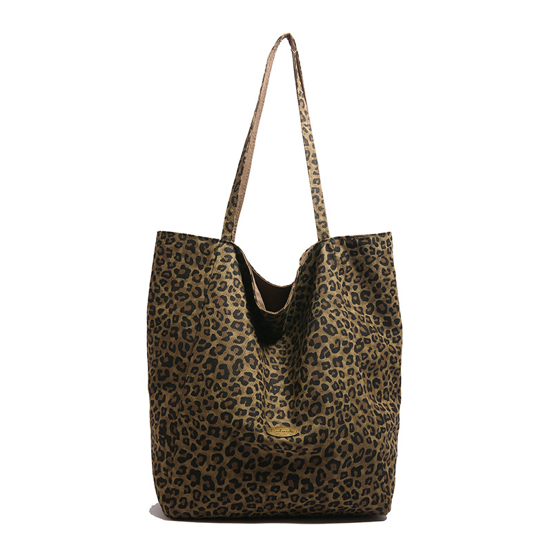 Bolsa de lona de leopardo para mujeres 2024 otoño nuevo estilo de moda bolsa de estilo universitario bolsa de transporte de gran capacidad bolsa de doble cara