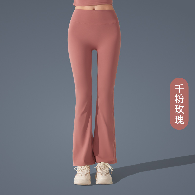 Pantalones de trompeta antibacterianos de sensación desnuda en Europa y los Estados Unidos nuevos estilos deportivos pantalones de yoga casuales muestran pantalones de fitness de cintura alta de plástico delgado