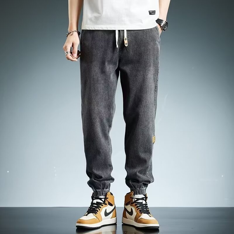 2024 primavera y otoño pantalones vaqueros de cintura elástica todo fósforo para hombres, pantalones de pierna ancha rectos sueltos para adolescentes de la calle principal