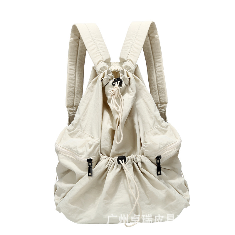 Corea del Sur Dongdaemun nuevo cordón mochila mujer casual gran capacidad estudiante mochila versátil mochila de nylon ligero