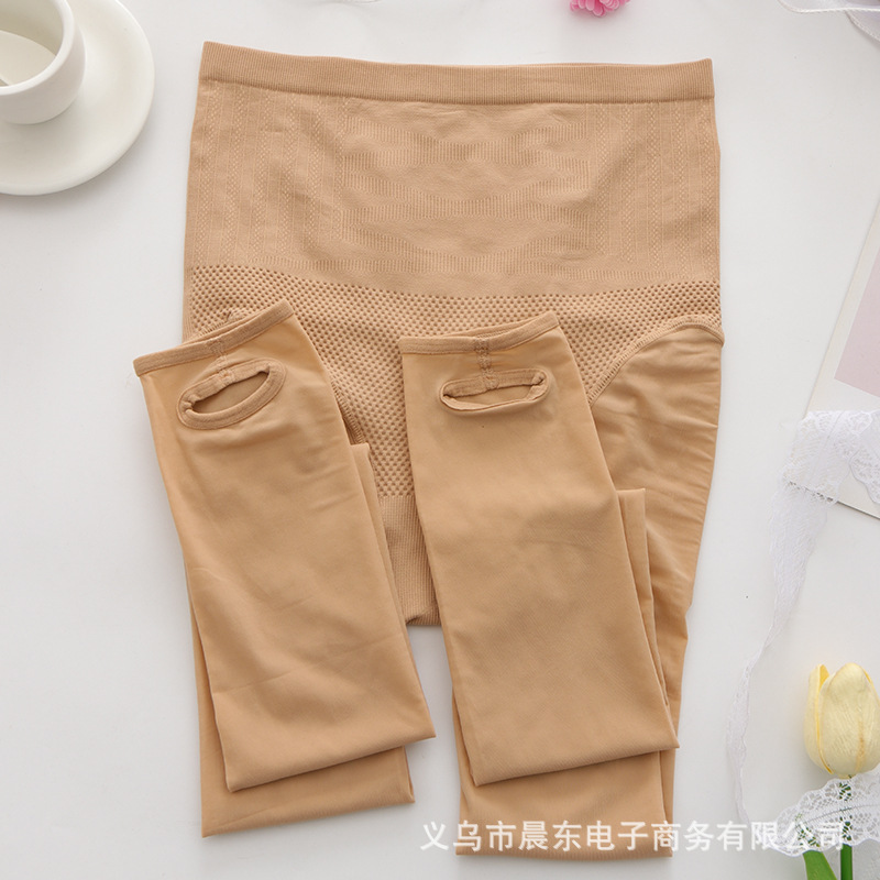 ストッキングの女性の薄いタイプの高腰は腹を収めてズボンの靴下の光の足の神器につながっています。|undefined