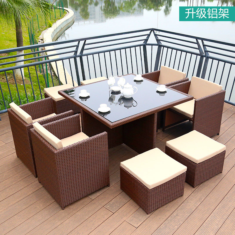 Mesa y silla al aire libre Villa patio jardín ocio silla de caña combinación impermeable al aire libre tabla de té de caña con paraguas