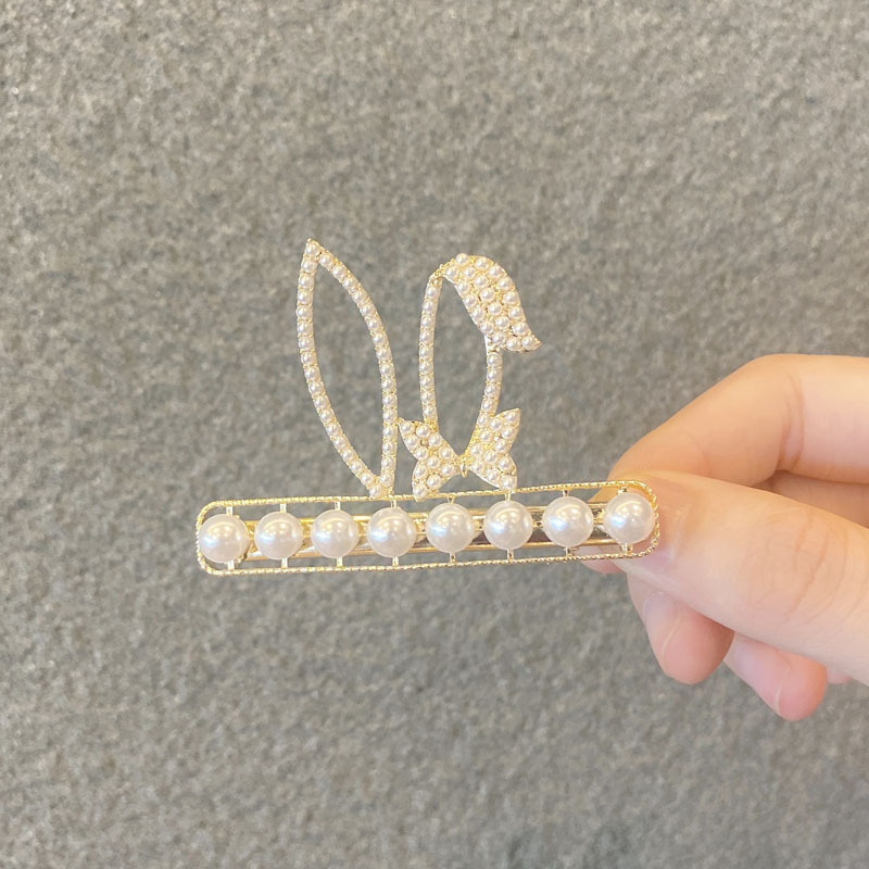 Wholesale Jewelry Imitation Pearl Rhinestone Rabbit Ear Korean Style Hairpin Nihaojewelry display picture 7