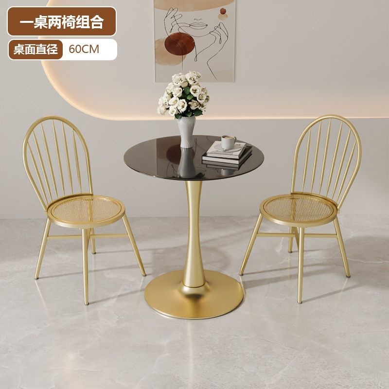 One table and two chairs - black table with gold frame