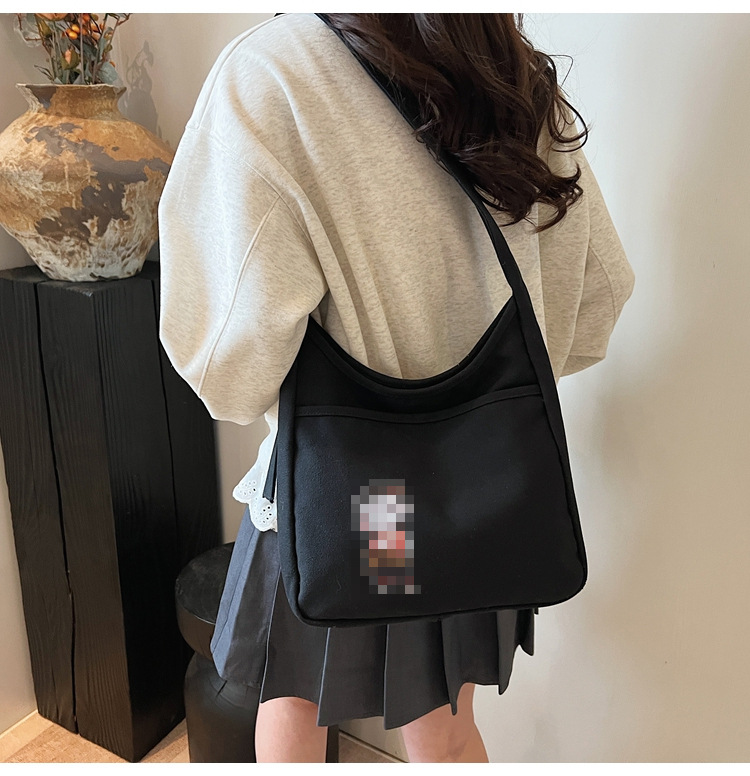 2025 nuevo bolso de lona bolso de hombro de gran capacidad para mujer bolso casual de todo fósforo para estudiantes en clase bolso de viaje