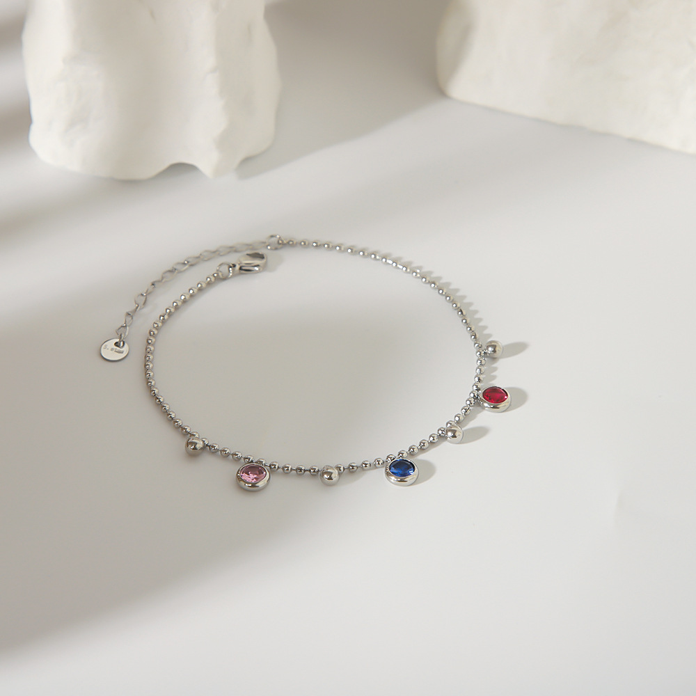 2024 nuevo estilo europeo y americano transfronterizo retro acero inoxidable color diamante redondo pequeña cuenta redonda borla colgante titanio acero tobillera mujer