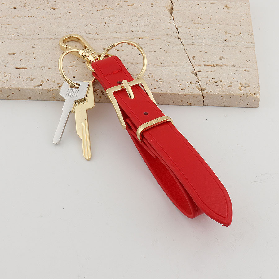 Xiaohongshu ins estilo explosivo uim caja de llaves de cuero colgante llavero de coche colgante pequeño de moda para hombres y mujeres