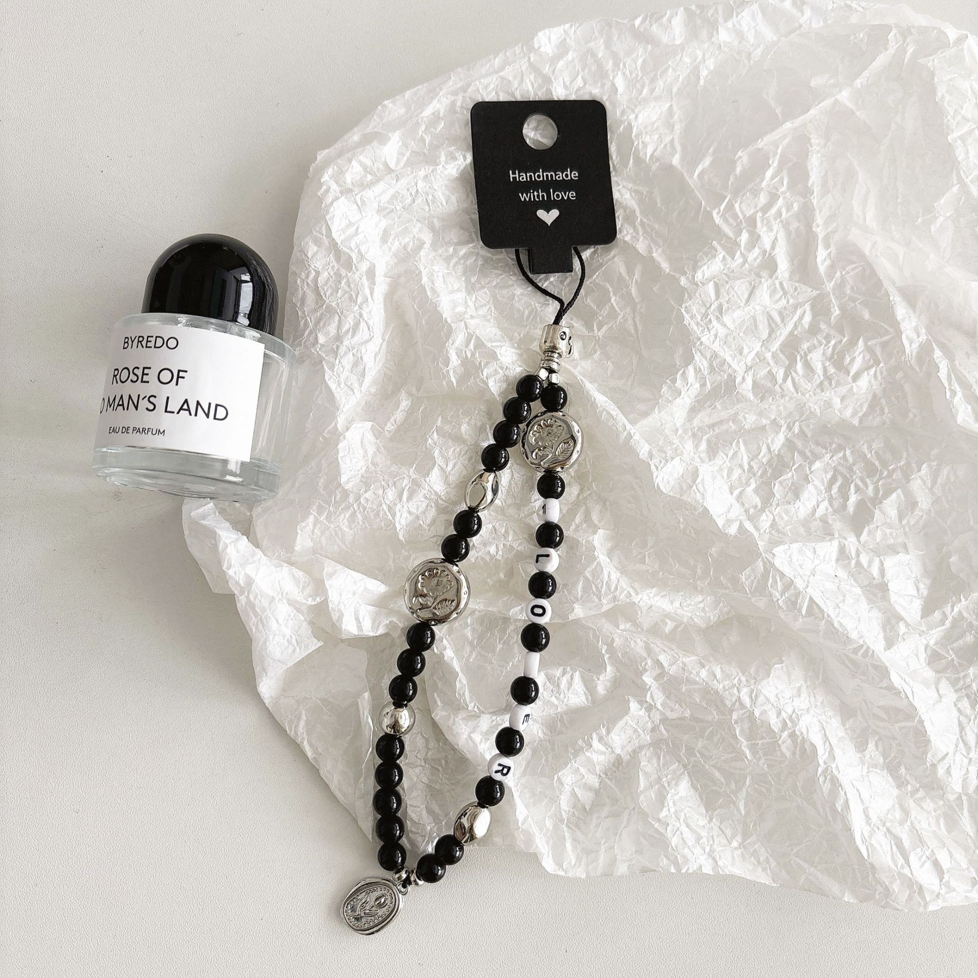 Cuentas de perlas hechas a mano, cadenas de teléfonos móviles, bolsos, colgantes, colgantes de muñeca, cuentas hechas a mano.