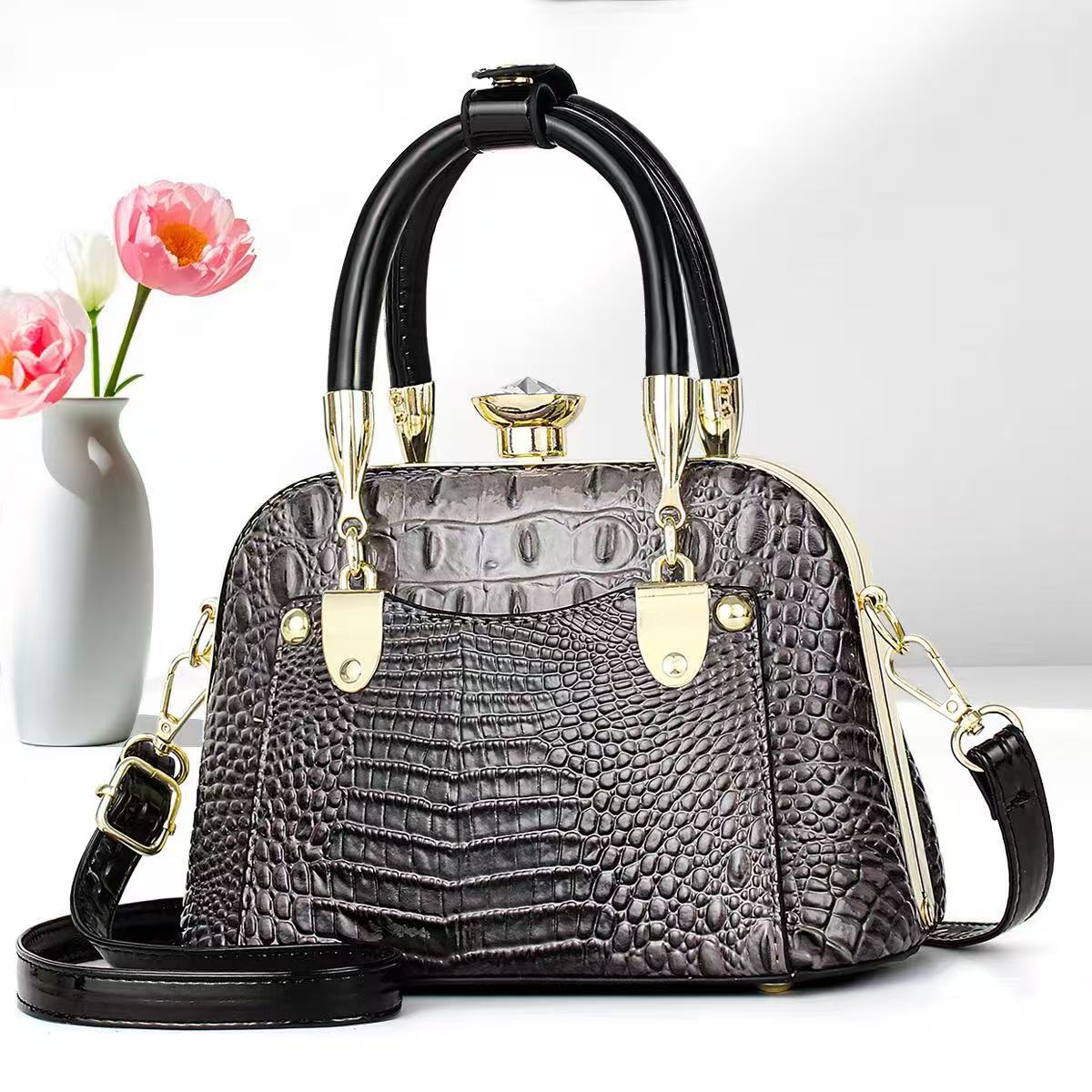 Bolsos de mujer verano nuevo estilo bolso de madre bolso de hombro de mediana edad bolso de mensajero de nicho de regalo de todo fósforo