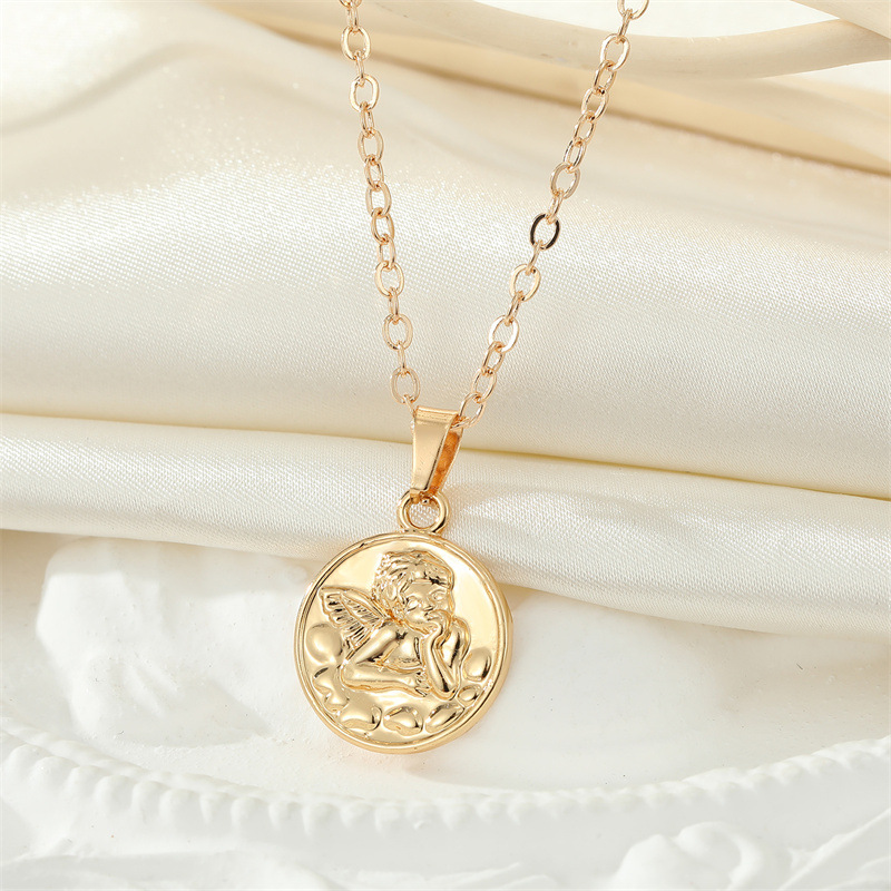 Fashion Golden Round Coin Embossed Angel Earring Necklace Set display picture 2