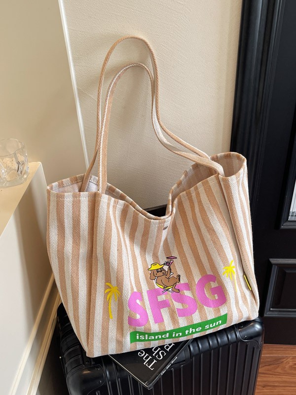 Versión coreana de Dongdaemun a rayas de dibujos animados estampado Mommy Tote lona bag 2025 nuevo estilo perezoso bolso de hombro mujer