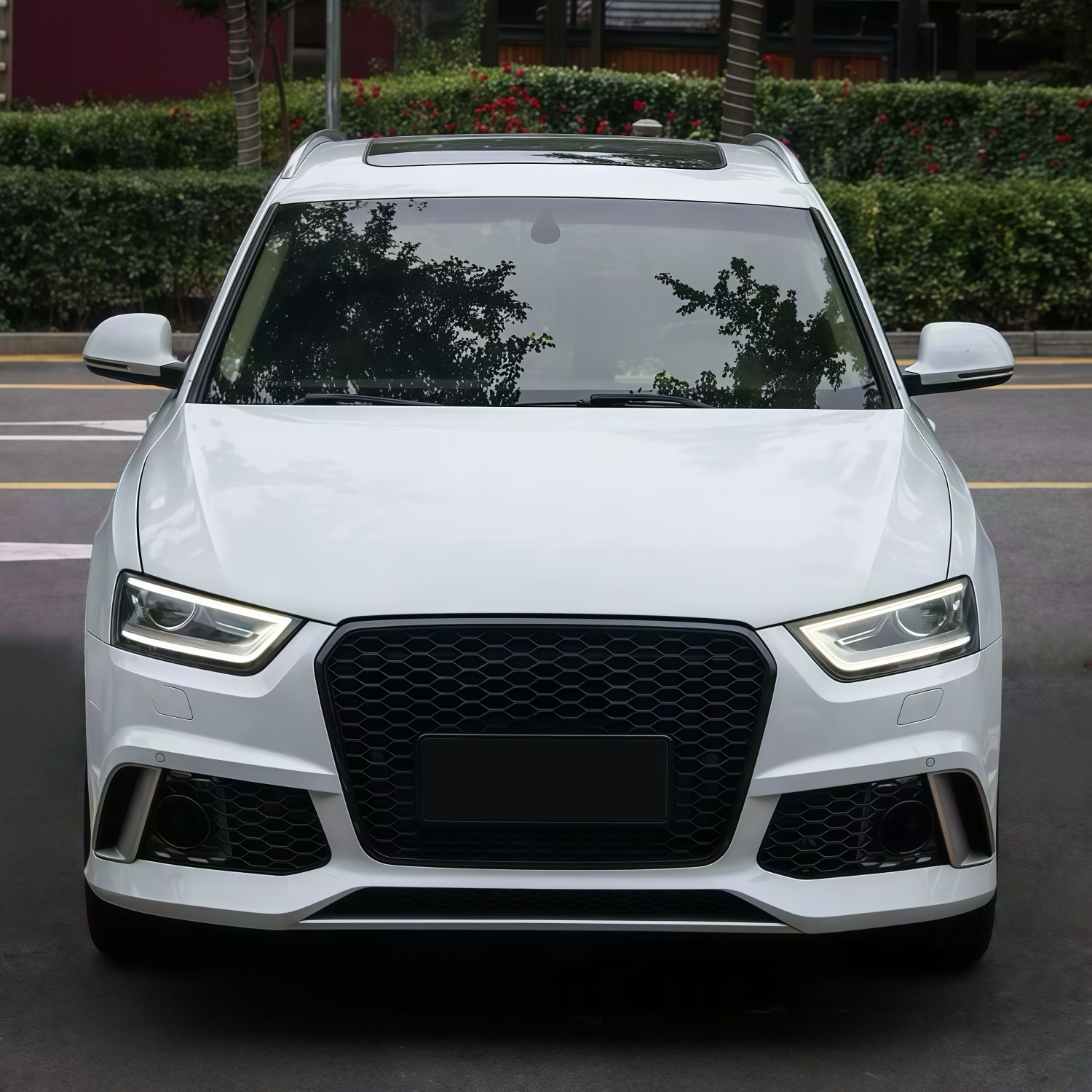 Suitable for Audi Q3 models from 2012-2015, this is an RS Q3-style front bumper, front grille, and front fascia kit
