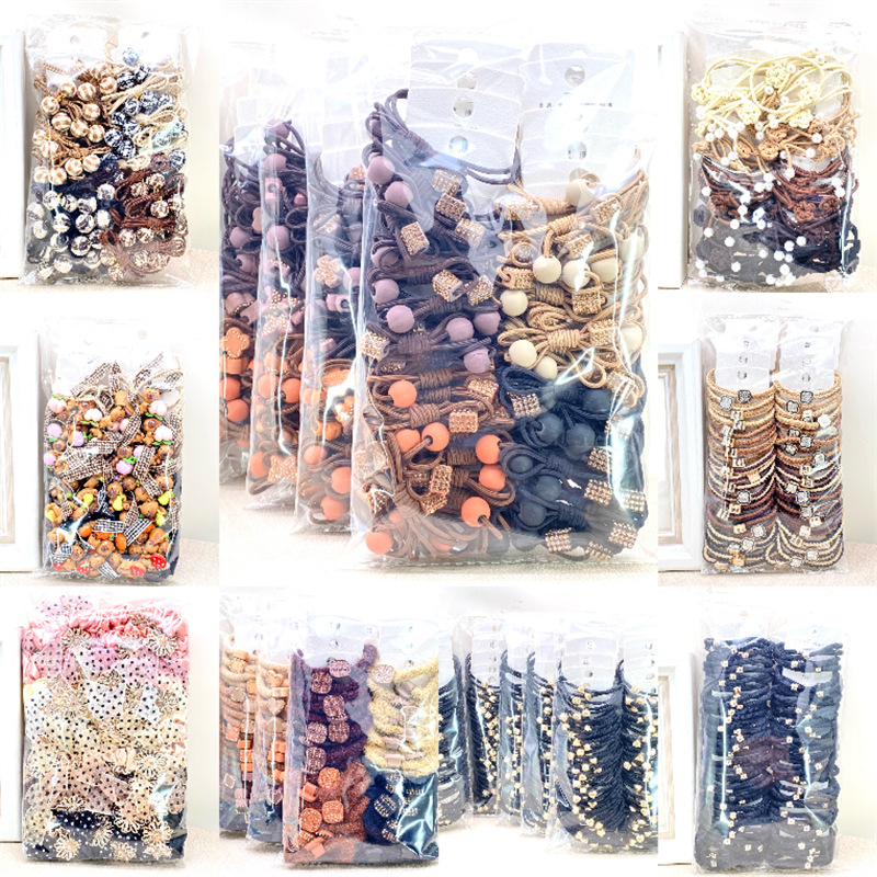 20 estilo coreano de dibujos animados lindo té de leche Tarjeta de color Banda de pelo banda de goma de color de primavera tienda física supermercado 2 yuanes tienda al por mayor