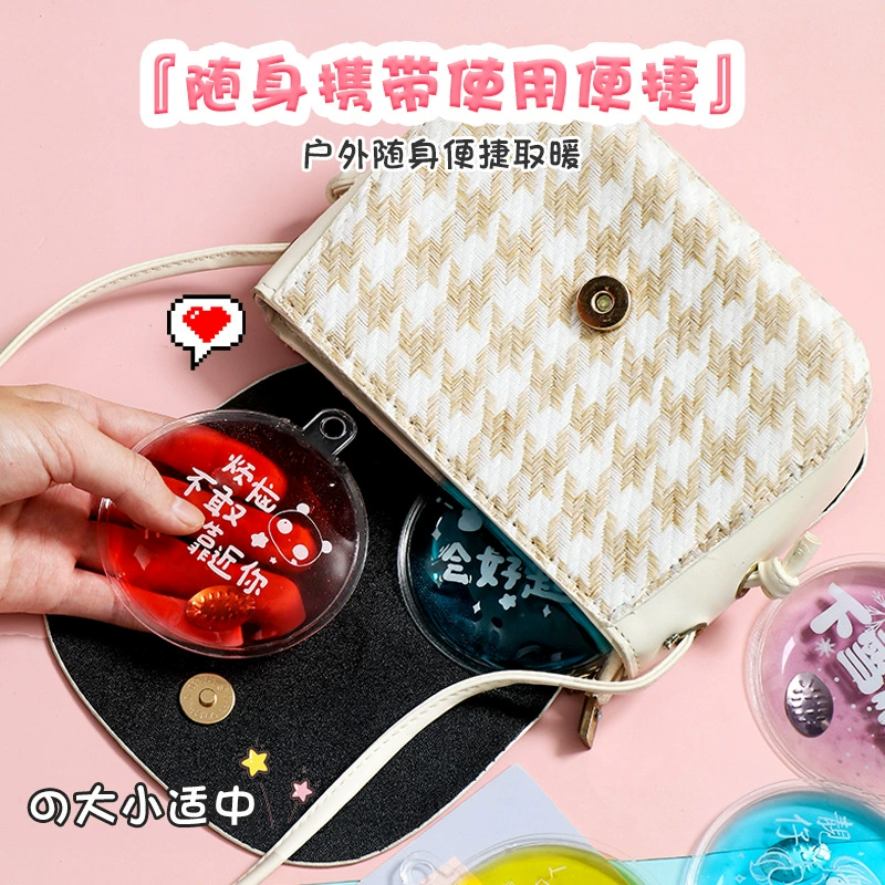 PVC hand warmer, 9.8×9.8 cm, assorted printed designs, lightweight 0.04 kg