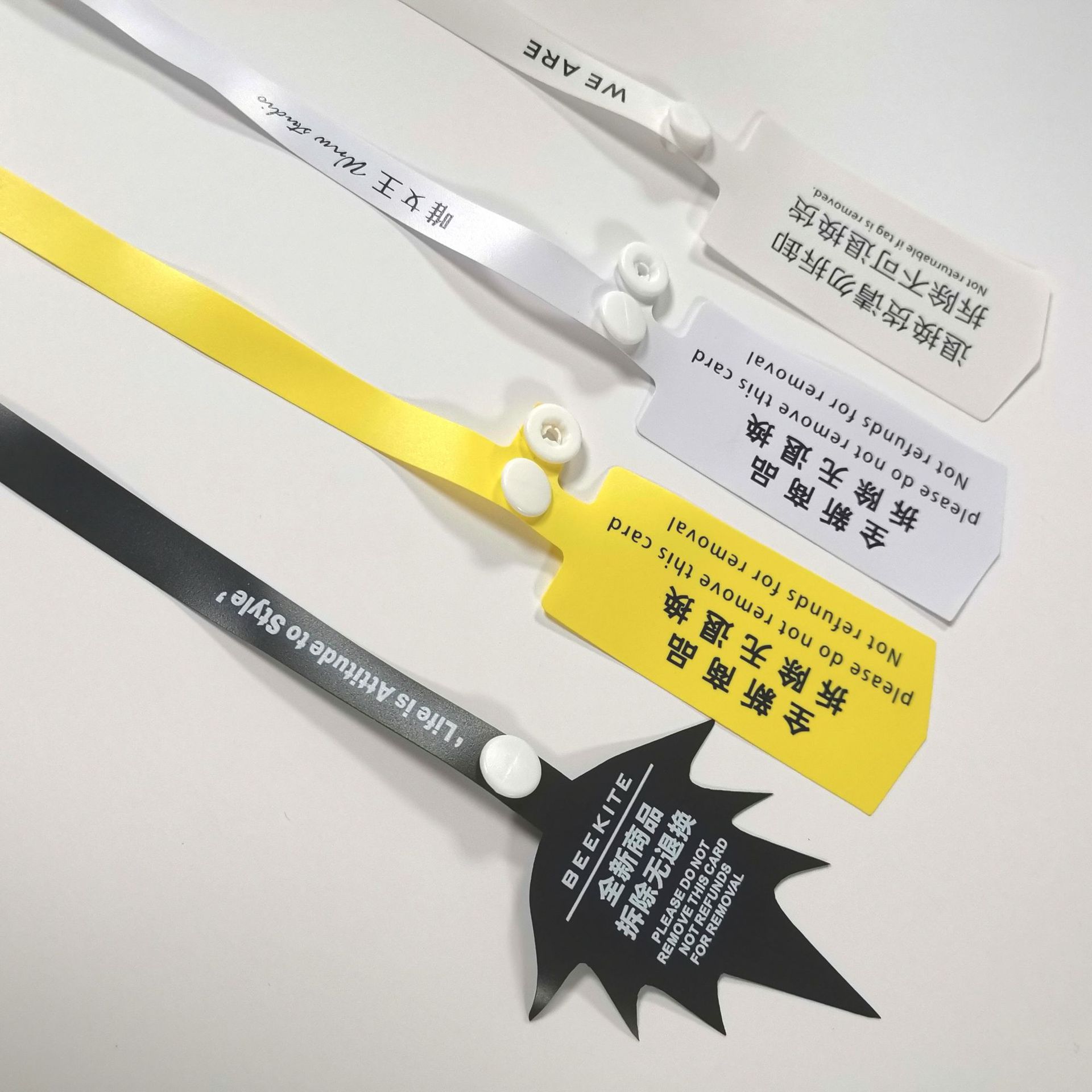 批发一次性软胶防拆防伪扣塑料pvc封条服装防调包防盗扣软胶标签