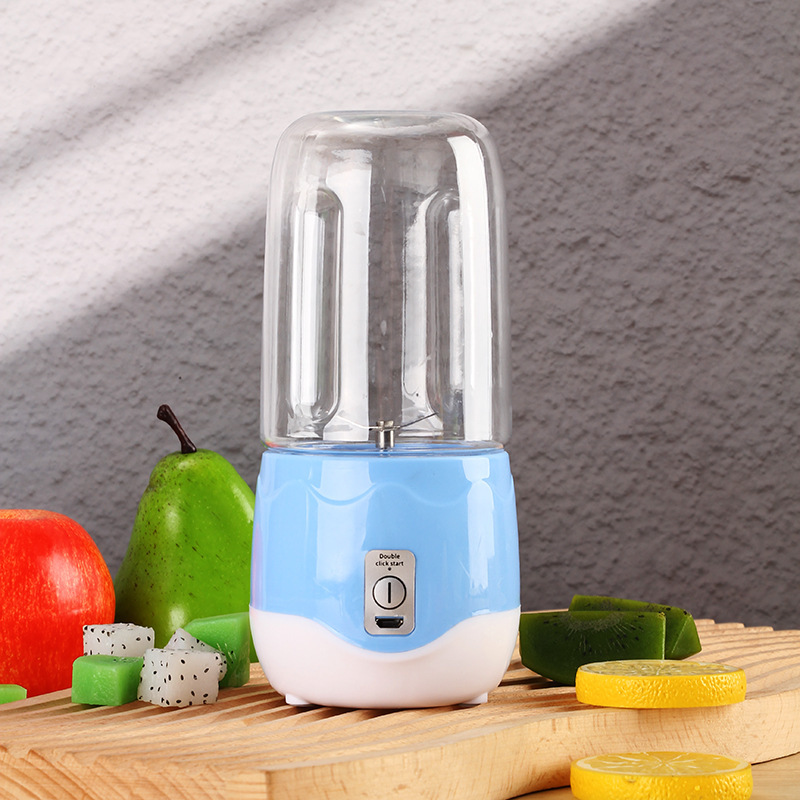 Fabricantes transfronterizos inglés pequeño portátil exprimidor eléctrico hogar mini exprimidor hoja de acero inoxidable exprimidor taza