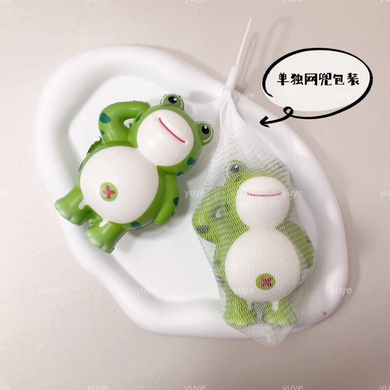 解凍神器敬礼カエルのおもちゃはゆっくりとリバウンドして人形を飾っています。|undefined