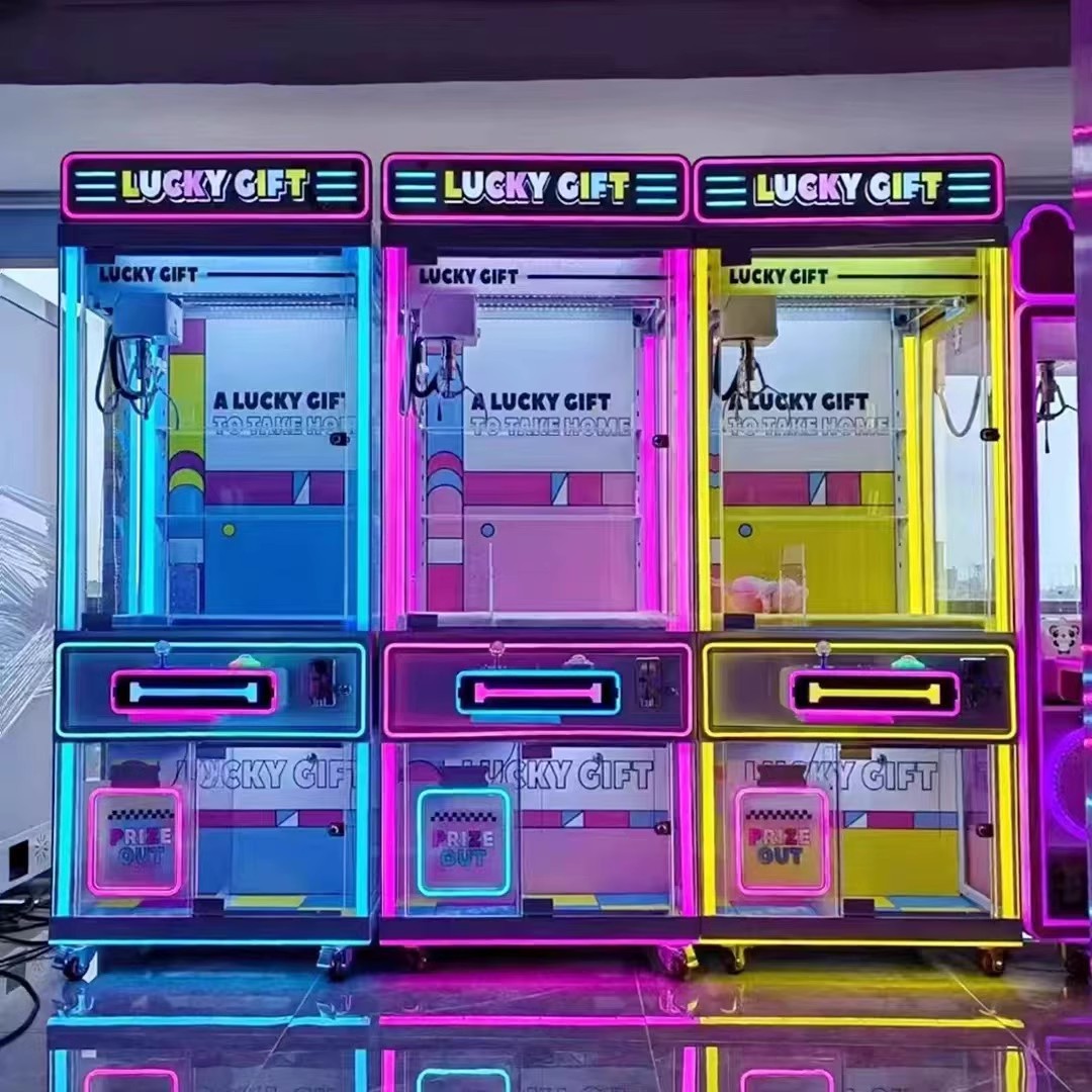 Máquina de garras comercial, máquina de peluches, máquina expendedora de snacks, máquina de garras, máquina que funciona con monedas, máquina de garras de entretenimiento, juego de arcade, juguete de moda.