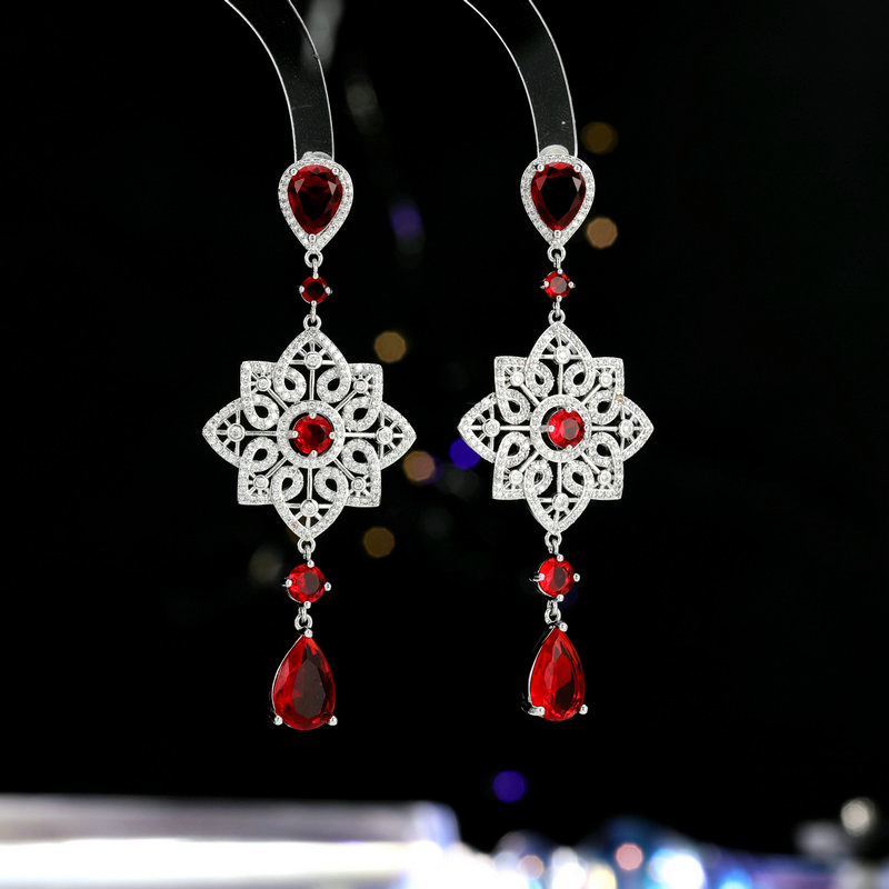 Light luxury high-end heavy industry earrings banquet dress with long hollow pattern water drop earrings_voghion.com