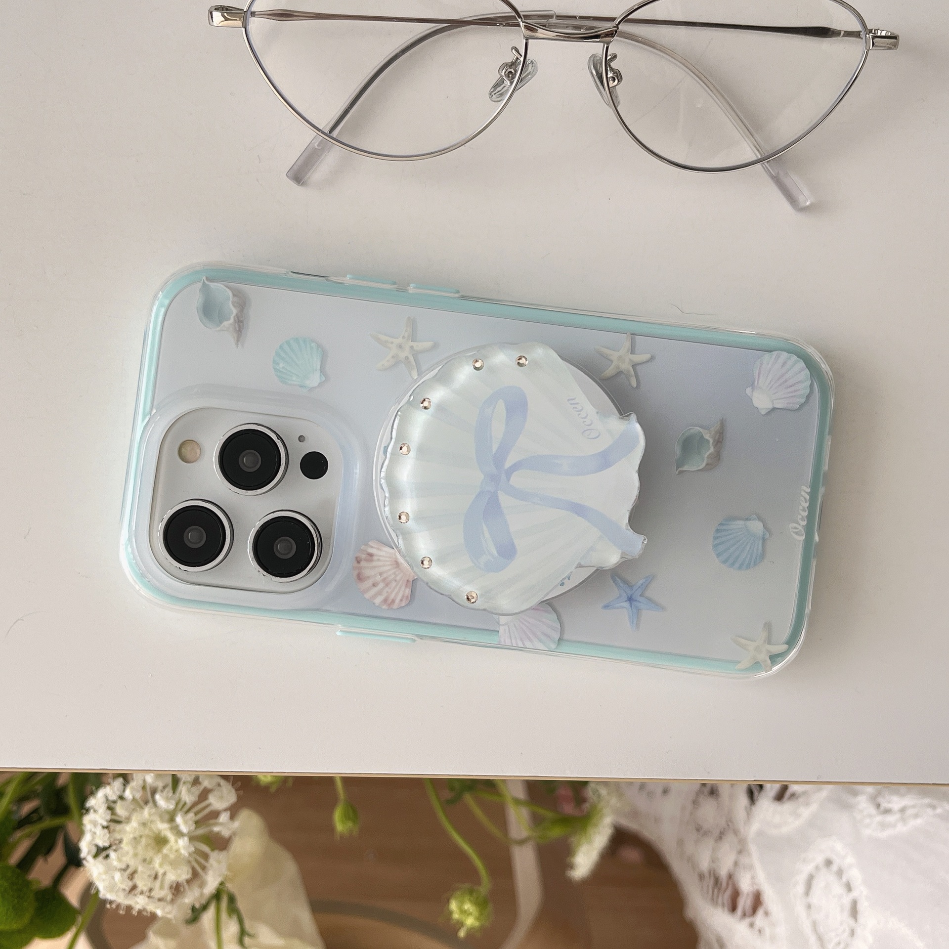 Verano pequeño fresco y simple concha para Apple 15ProMax funda para teléfono móvil 16Pro atracción magnética 14/13 pareja 16