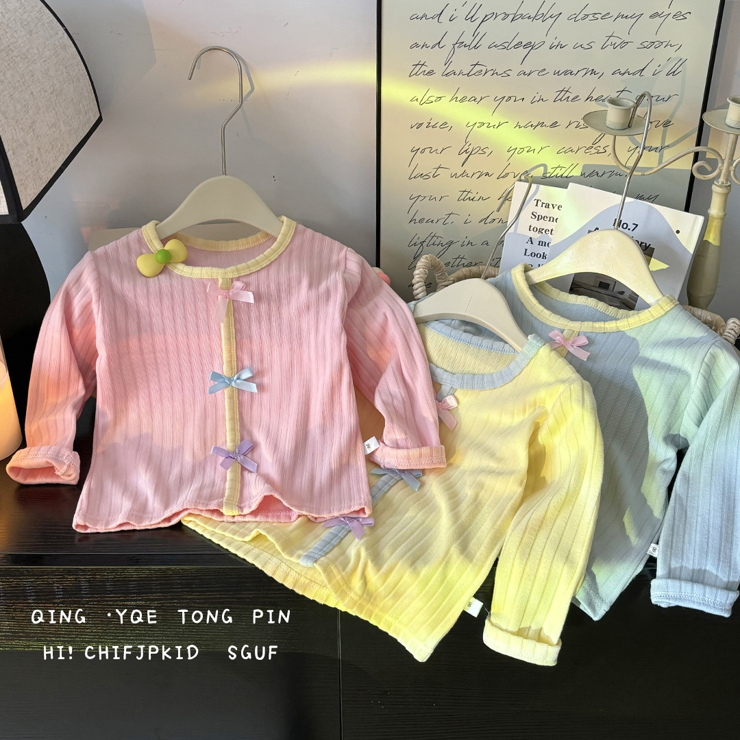 Primavera y otoño de los niños nuevos productos de bebés femeninos camisetas de fondo chaqueta arco coreana suéter universal adorable dulce al por mayor