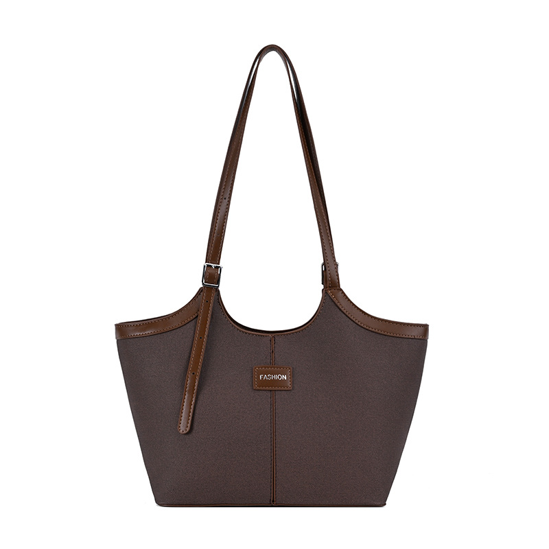 Bolsa de mano retrógrada de nicho para mujeres 2026 comercio exterior nuevo color de choque de alta calidad bolso de hombro de gran capacidad