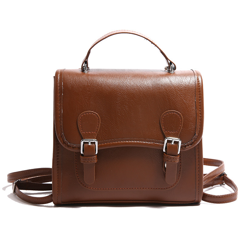 Colegio retro coreano doble hebilla estilo británico 2024 literatura y arte ocio de gran capacidad de moda textura mochila de hombro