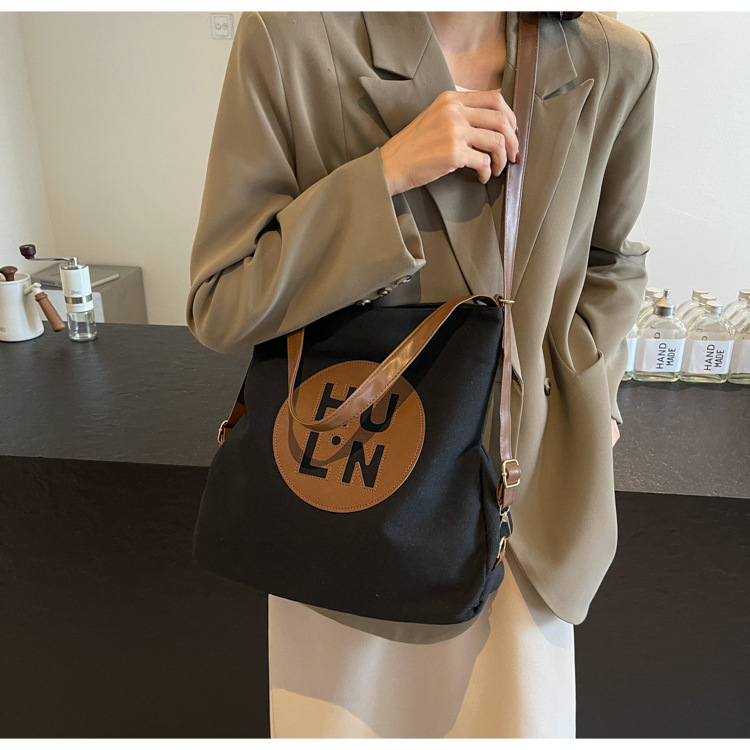 Korean letter printed multi-purpose cloth bag, 2024 new style, high-quality student backpack, commuting single-shoulder bag undefined