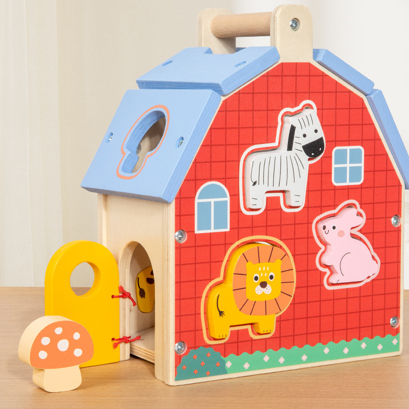 Animal shape matching house with removable wooden pieces