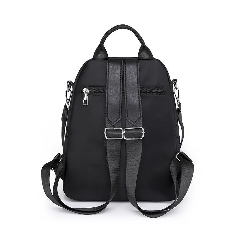 2024 nueva mochila de nailon para mujer, bordado de moda, mochila de viaje de cercanías al aire libre, mochila multifuncional al por mayor