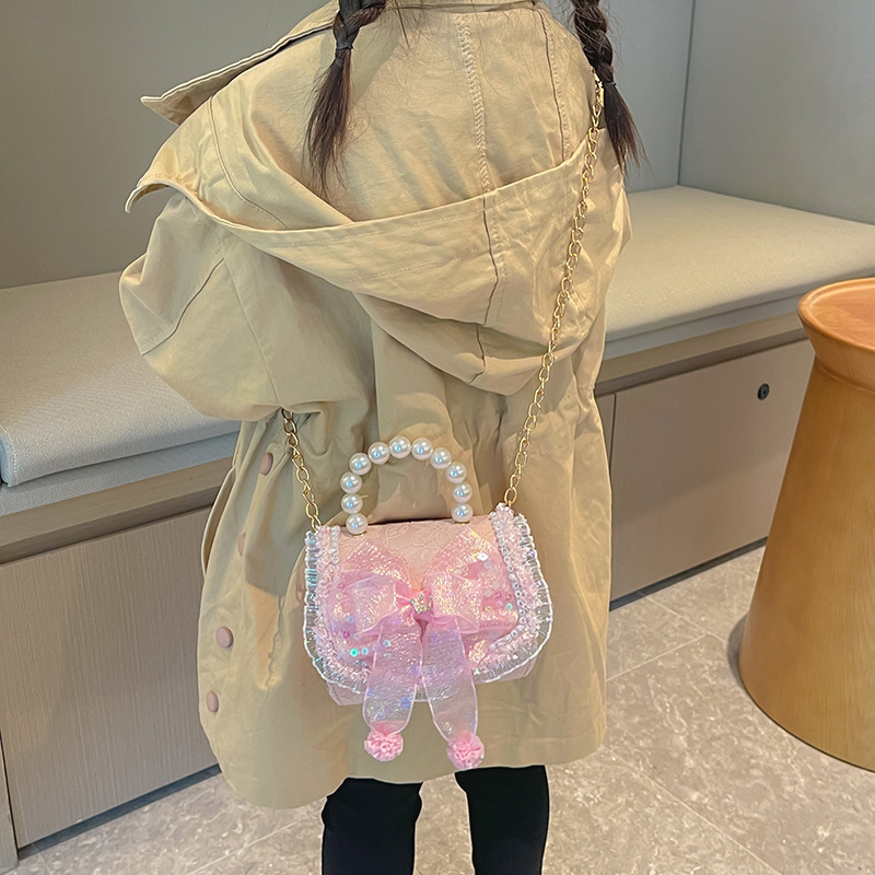 Bolso infantil de perlas 2024 nueva chica arco de moda, bolsa de tramo inclinada, princesa de moda, accesorios de algodón y lino, bolso