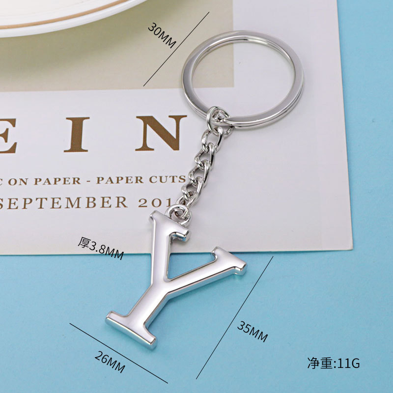 Inglés carta llavero bolsa colgante 26 letras mayúsculas y minúsculas y números llavero europeo y americano pequeño regalo personalización