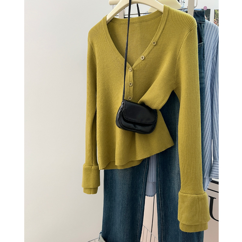 Autumn knitted green colored sweater