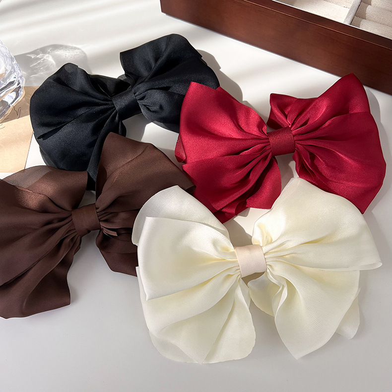 Sweet Solid Color Bow Knot Cloth Hair Clip 1 Piece display picture 1