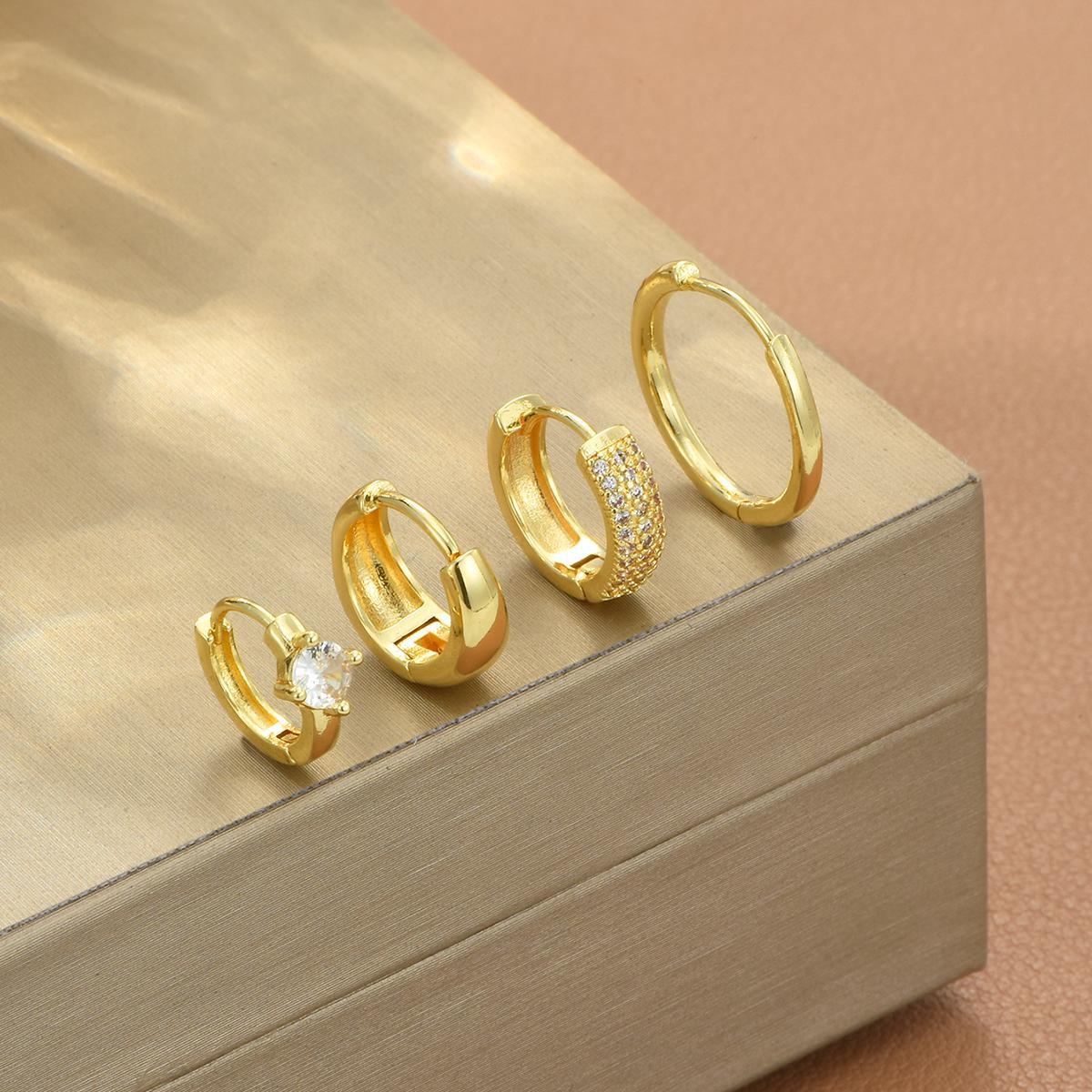 Amazon delicado material de cobre de moda simple ligero pendientes de anillo estilo casual nuevo estilo de moda moda pernos de orejas mujeres