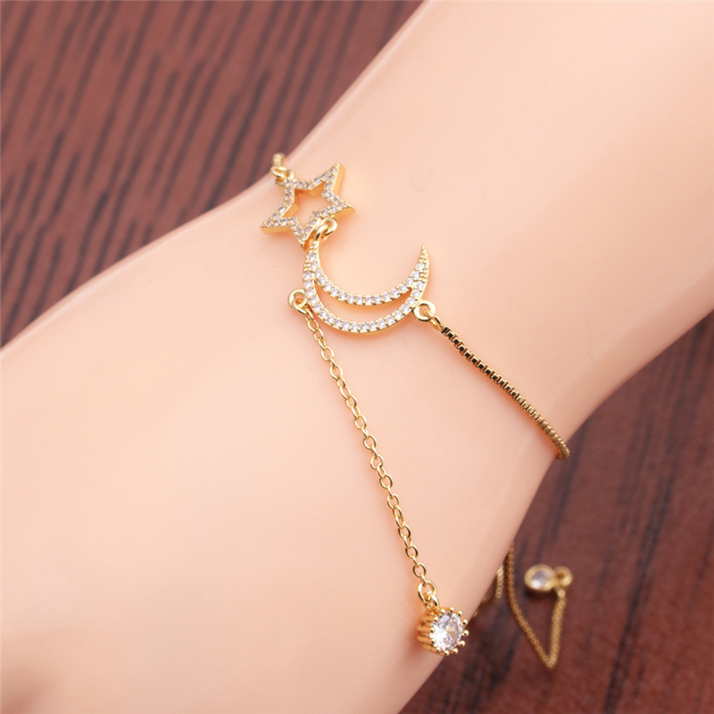 Pulsera Ajustable De Circonitas Doradas Con Luna Y Estrellas display picture 8