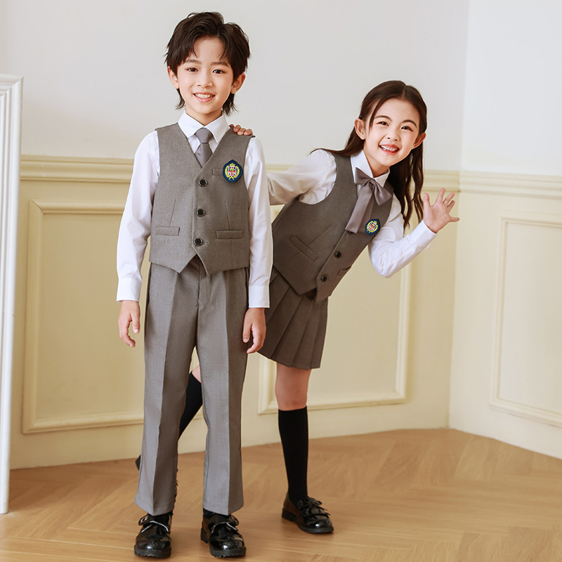 Ropa de jardín de infancia Primavera y otoño estilo británico traje vestido de primer grado ropa de cuatro piezas de escuela primaria uniforme traje