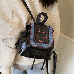 精致迷你女式双肩包2025新款撞色百搭通勤后背包旅行包超火小书包