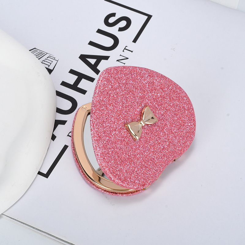 Espejo pequeño de amor de alto valor con mini dormitorio de estudiante espejo plegable de doble cara espejo de maquillaje portátil redondo