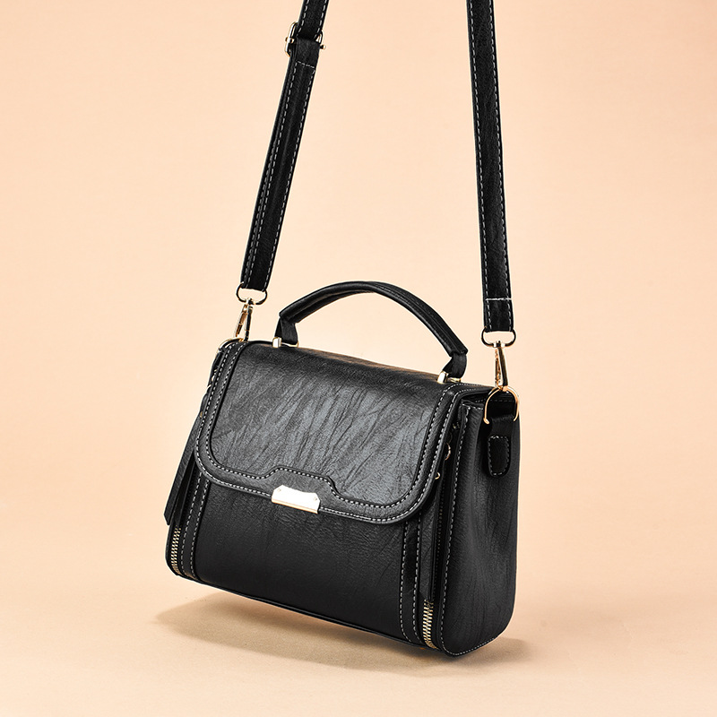 Bolsa de mano para mujeres Taizhou bolsas de mujer retro bolsas de hombro de hombro universal de moda alta sensación de bolsas de madre