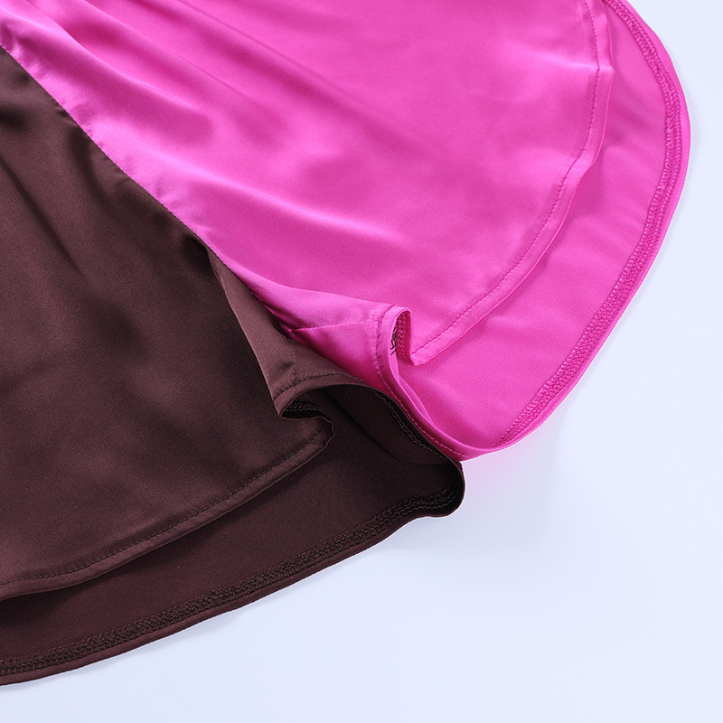 La parte superior corta y los pantalones cortos rectos con costuras de colores contrastantes se adaptan a la ropa al por mayor de nihaostyles NSXE80609