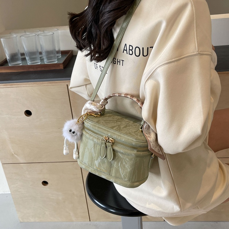 Bolsos versátiles sencillos de alta calidad para mujeres 2026 primavera y verano nuevo nicho bolso de cubo de diseño coreano bolso de hombro