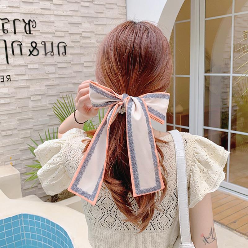 Banda de pelo de bufanda de seda corbata de pelo femenina Shixi Cinta de lazo de perla sale todo partido cuerda de cabeza Shixi 2021 cabello nuevo