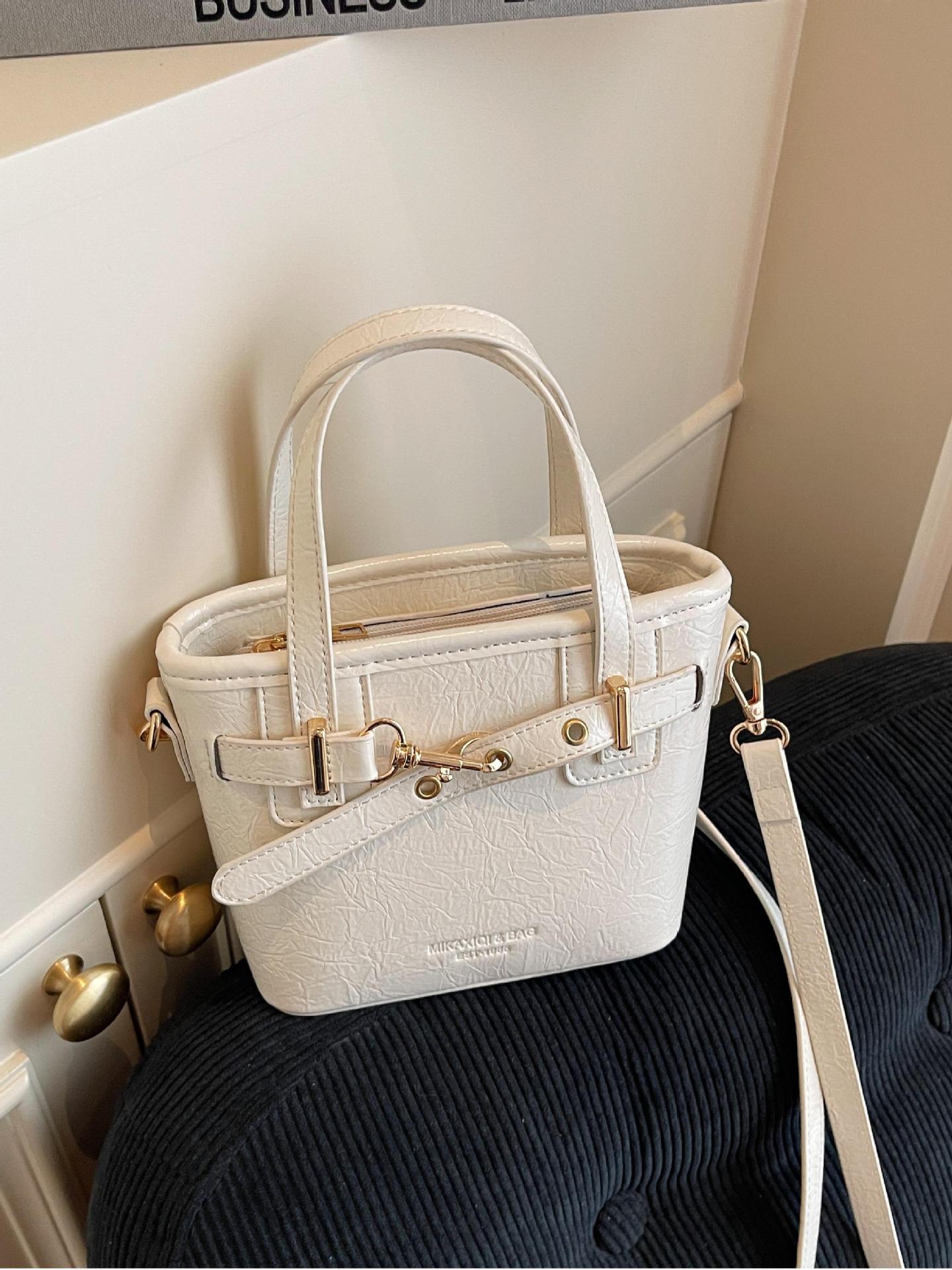 Comercio exterior de cercanías bolso de cubo de mano de todo fósforo femenino 2025 nuevo bolso de canasta de verduras de tendencia de todo fósforo bolso de mensajero de sentido avanzado