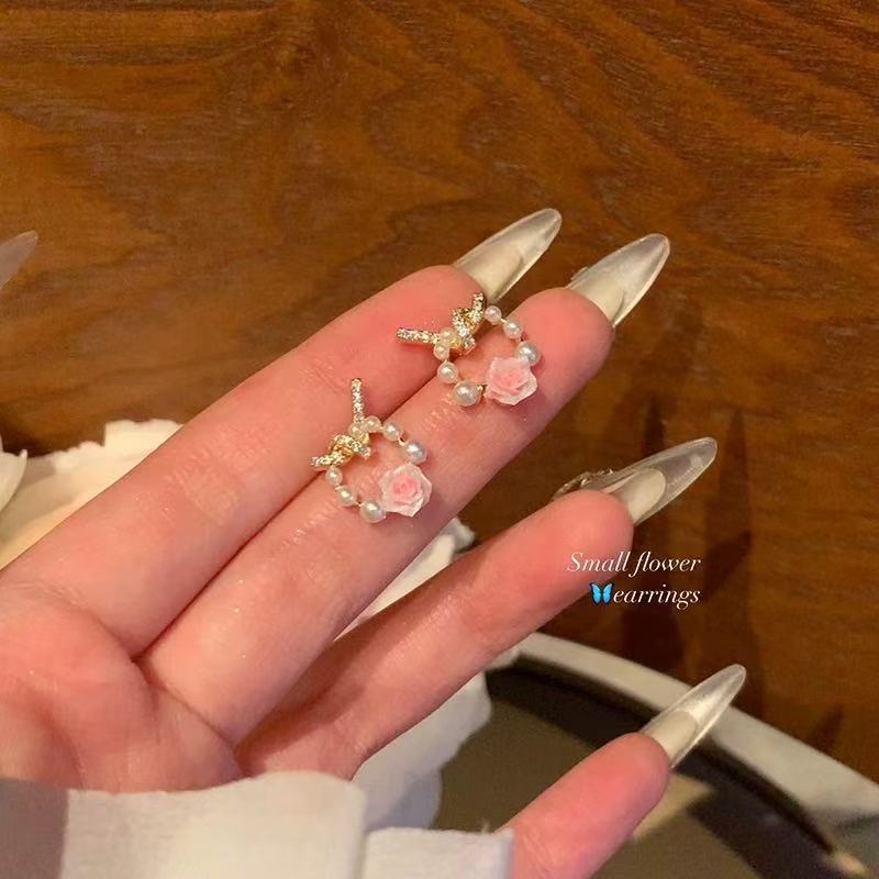 Aguja de plata, perla, circón, borla, pendientes de moda, lujo ligero, pendientes de alta gama, pendientes de todo fósforo exquisitos de nicho, mujeres al por mayor