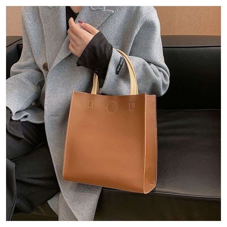 2024 New Bags Korean Version Versatile Commuting Bags Large Capacity Portable Tote Bag Temperament Popular Women’s Bag Vertical Style_voghion.com