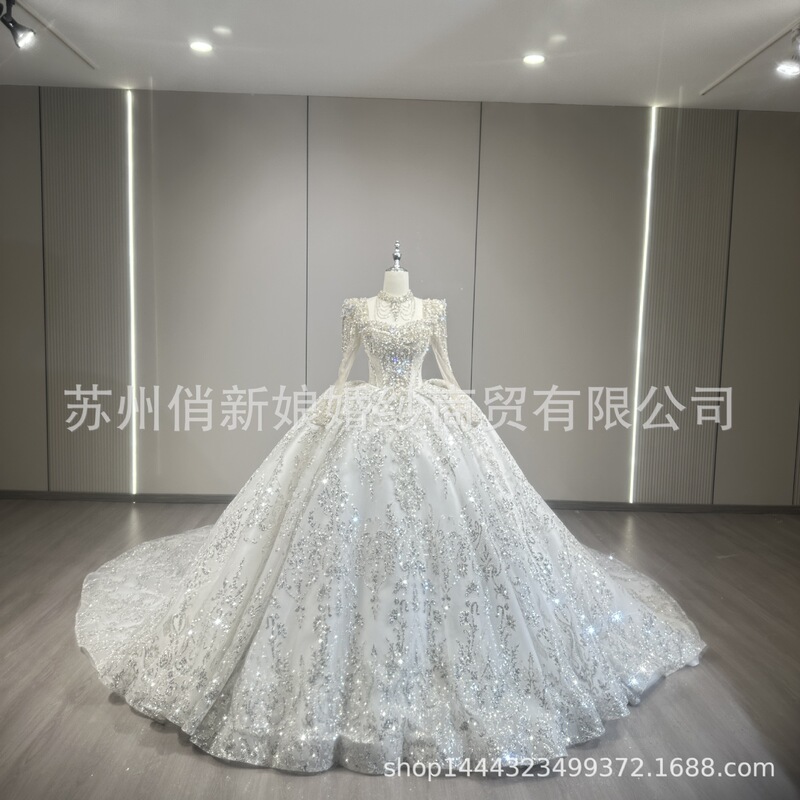 New 2026 Princess Court-Style Wedding Dress with Long Train, Heavy Craftsmanship, Long Sleeves, High-End Texture, and Dazzling Sparkle for the Bride